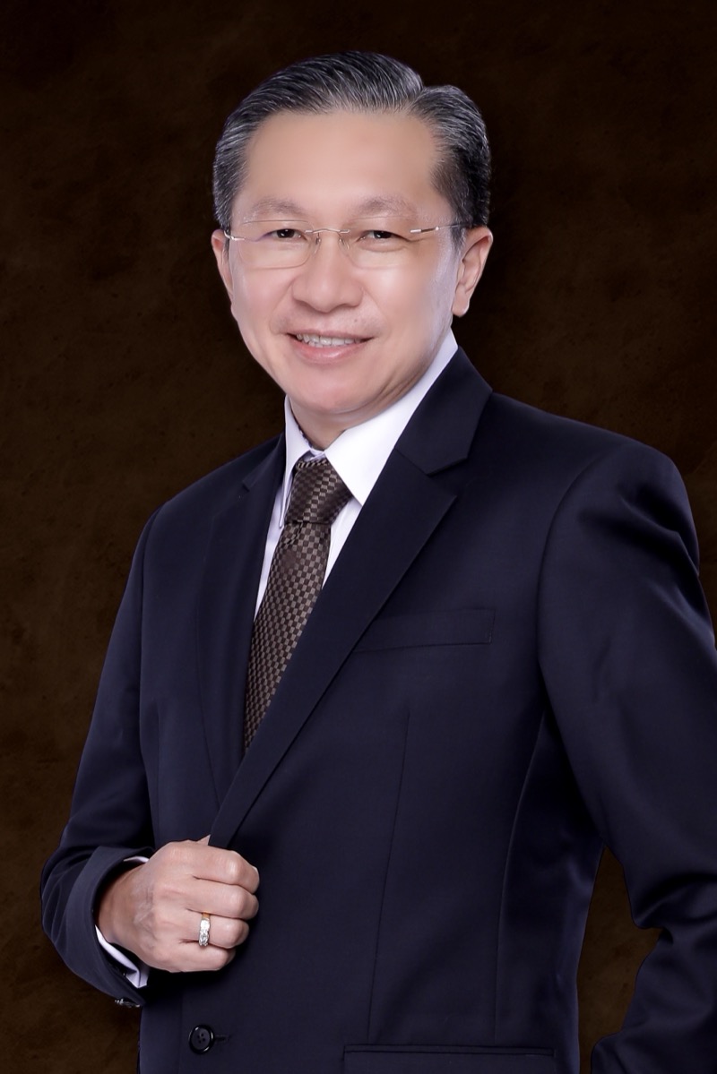 Portrait of Tawatchai, Chief Executive Officer of Global Plus Intertainment